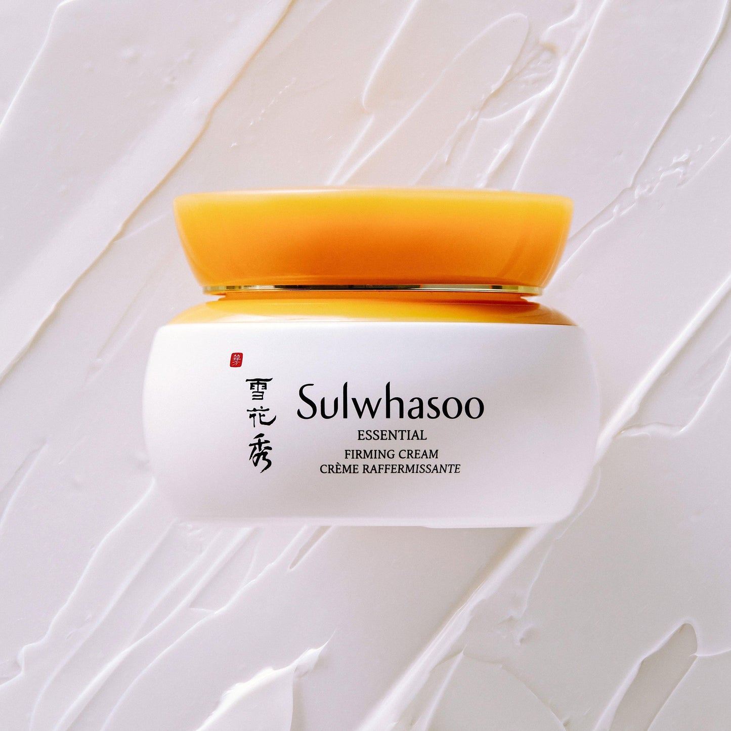 A 75ml jar of Sulwhasoo Essential Comfort Firming Cream, a skincare product for anti-aging and firming.