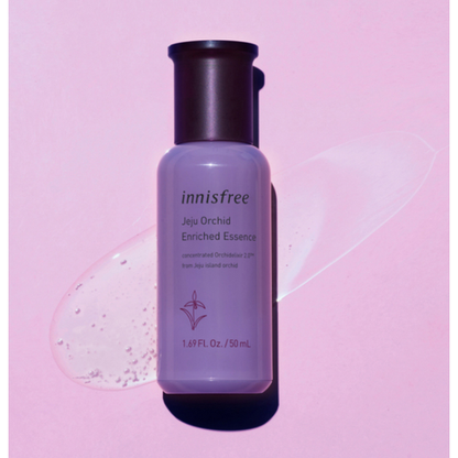 A bottle of Innisfree Jeju Orchid Enriched Essence, an anti-aging facial essence for a healthy glow and improved firmness.