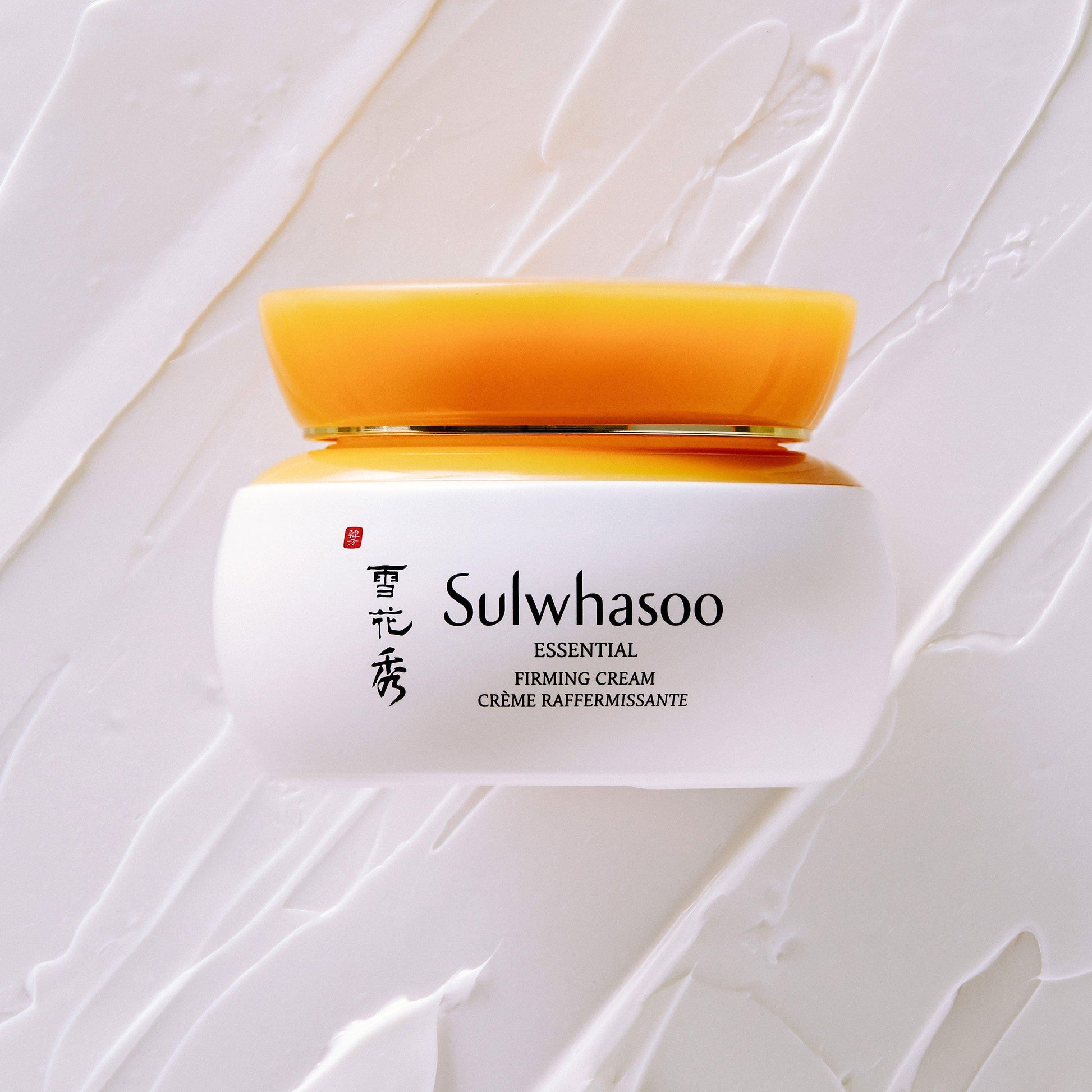 A 75ml jar of Sulwhasoo Essential Comfort Firming Cream, a skincare product for anti-aging and firming.