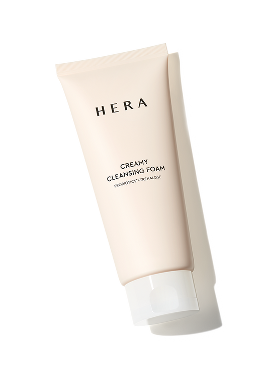 A white tube of Hera Creamy Cleansing Foam, a 200g facial cleanser.