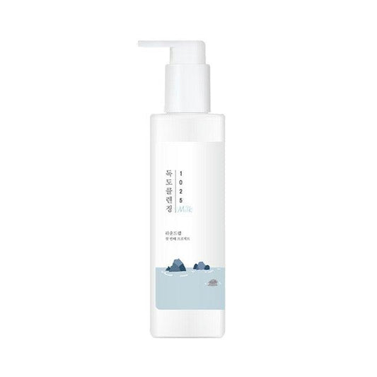 White bottle with pump dispenser of Roundlab 1025 Dokdo Cleansing Milk, a gentle facial cleanser for sensitive skin.