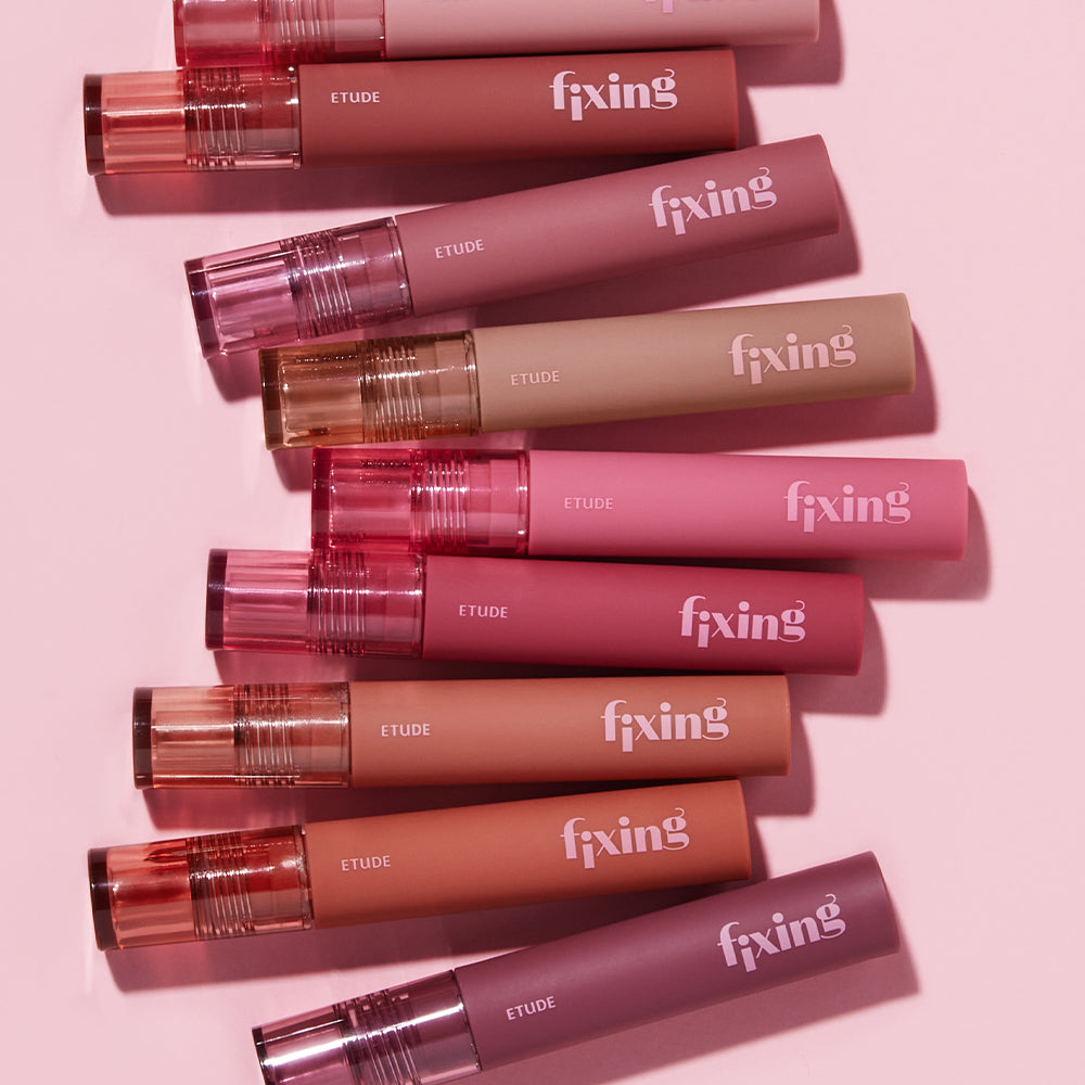 Etudehouse Fixing Tint in Analog Rose, a cool-toned pink liquid lip tint with a long-lasting, matte finish.