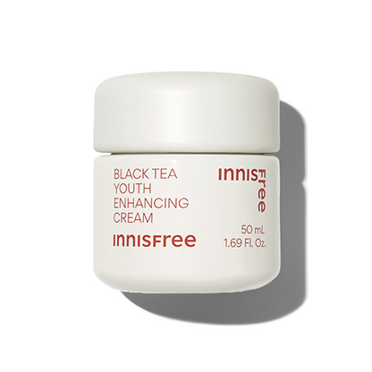 A 50ml jar of Innisfree Youth Enhancing Cream, a hydrating anti-aging cream formulated with black tea extract.