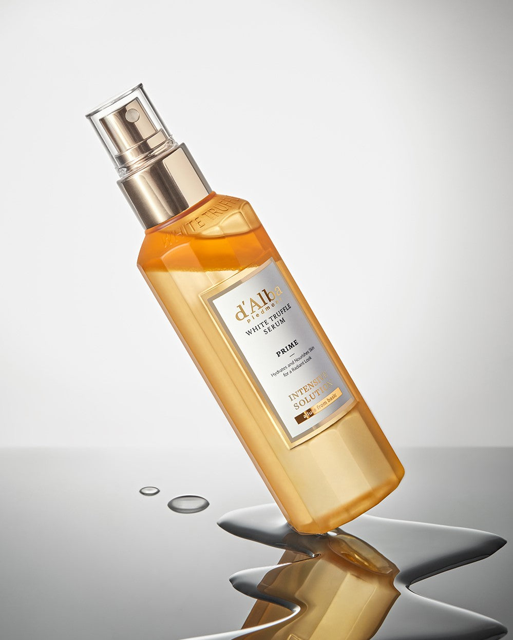 A 100ml bottle of d'Alba White Truffle Prime Intensive Serum, a luxurious facial serum formulated with white truffles for deep hydration and a radiant glow