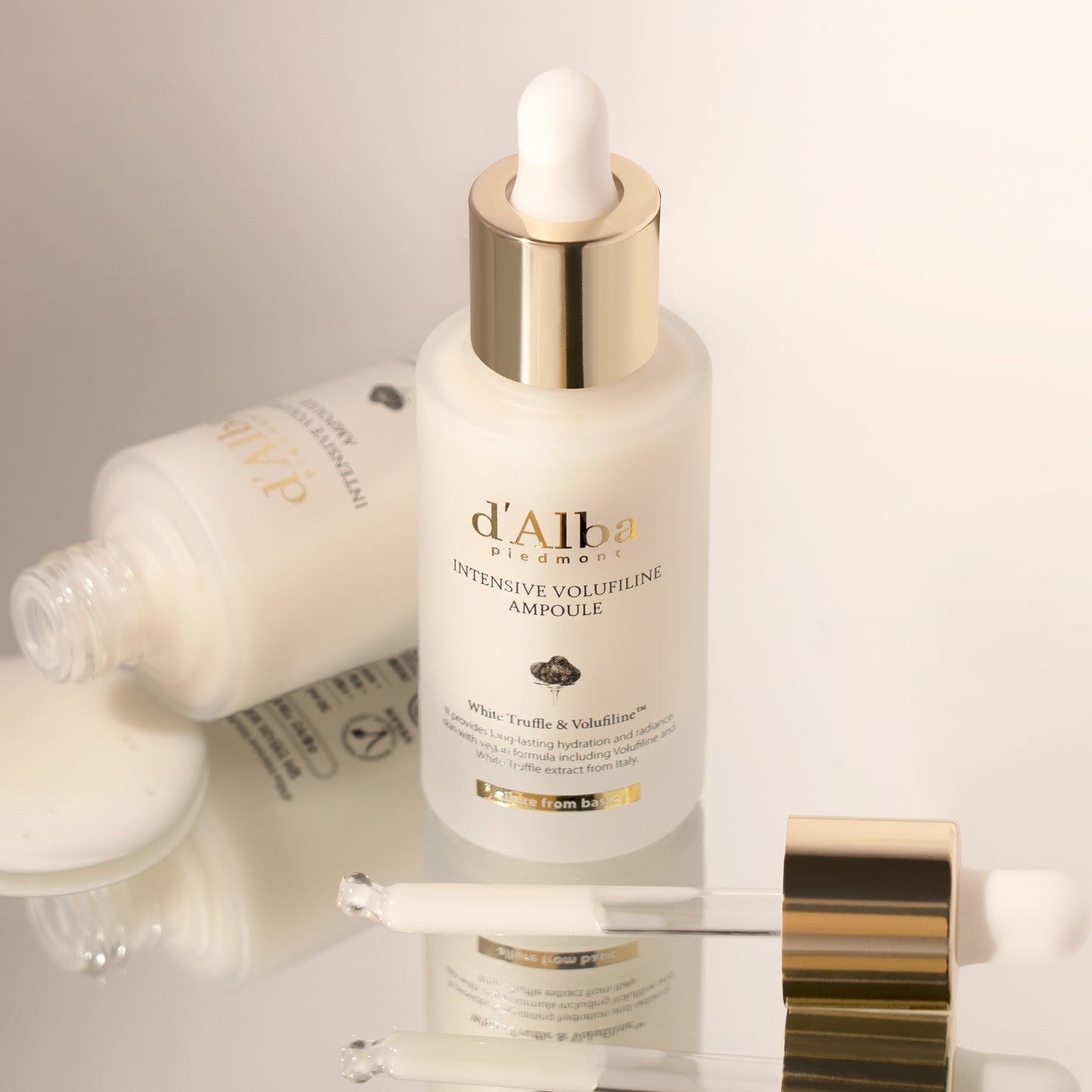 A small, 30ml glass bottle with dropper containing d'Alba Intensive Volufiline Ampoule, a Korean skincare product for firming and hydrating skin.