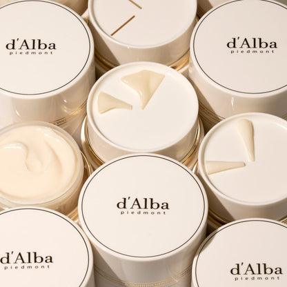 Jar of d'Alba Intensive Volufiline Grinding Cream, a Korean skincare product that dispenses fresh, collagen-rich cream for firmer, more elastic skin.