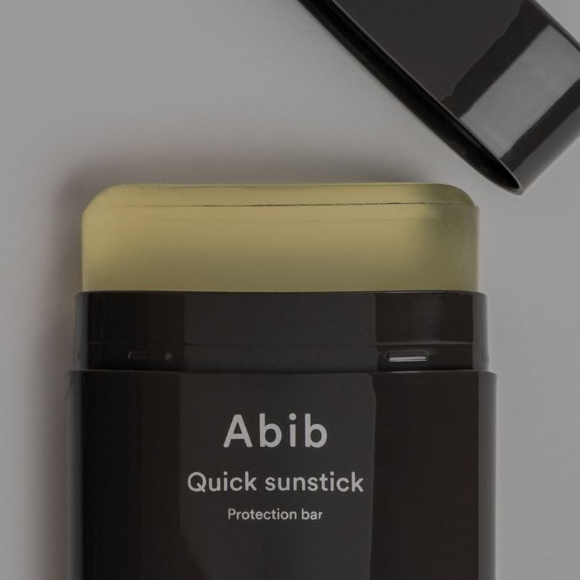 Portable Abib sunscreen stick with SPF 50+ PA++++ for daily sun protection.