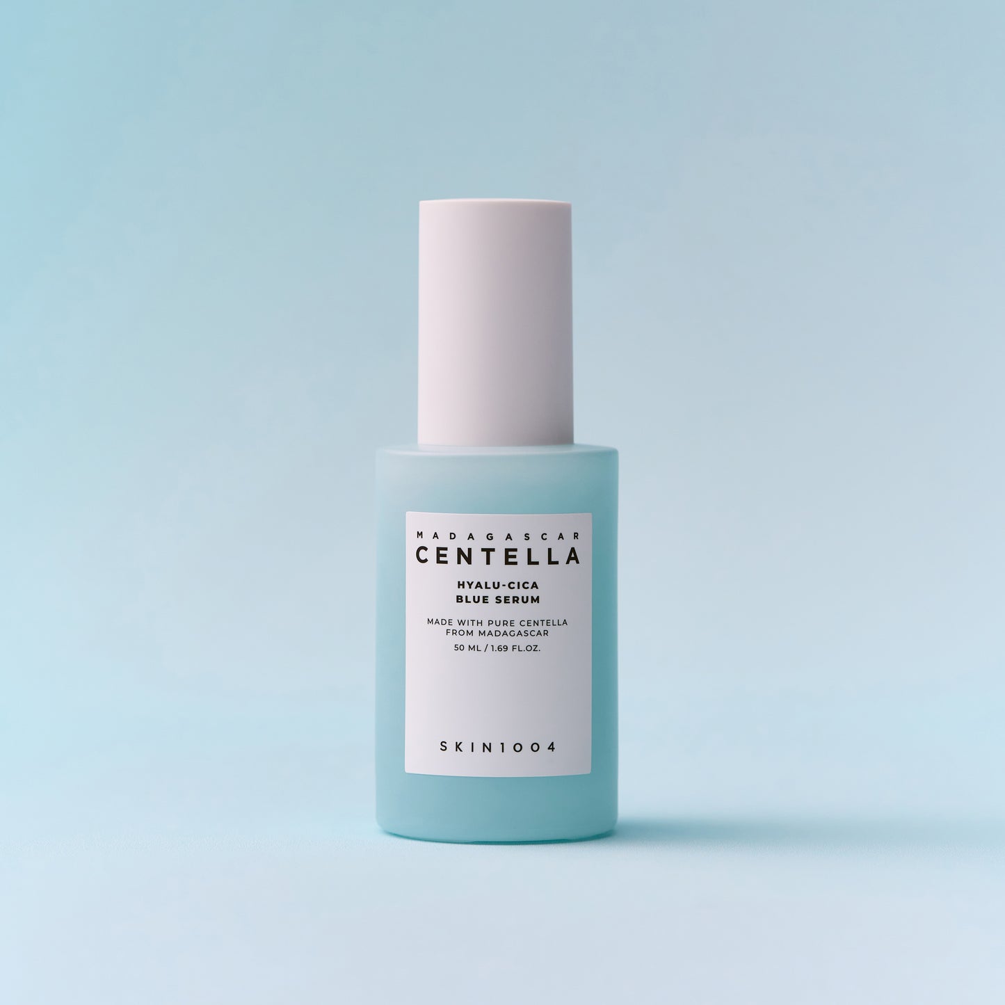 50ml bottle of Skin1004 Madagascar Centella Hyalu-Cica Blue Serum, a hydrating blue gel serum for calming and brightening skin.