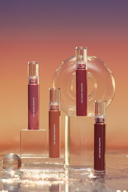 Romand Glasting Water Tint #Sunset, a lightweight, glossy lip tint for a natural flush of color.