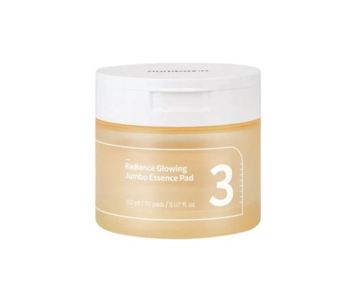 A jar of Numbuzin No. 3 Radiance Glowing Jumbo Essence Pads, containing 70 pre-soaked pads in 150ml of essence for brightening and hydrating skin.