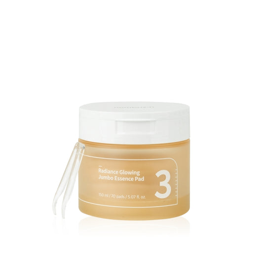 A jar of Numbuzin No. 3 Radiance Glowing Jumbo Essence Pads, containing 70 pre-soaked pads in 150ml of essence for brightening and hydrating skin.