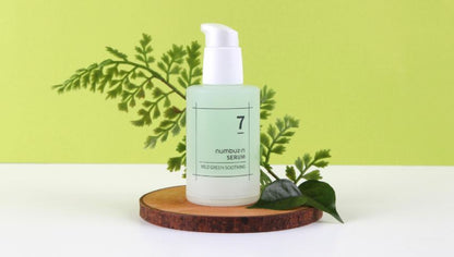 50ml bottle of Numbuzin No. 7 Mild Green Soothing Serum, a green-colored, water-gel texture for calming and hydrating sensitive skin.