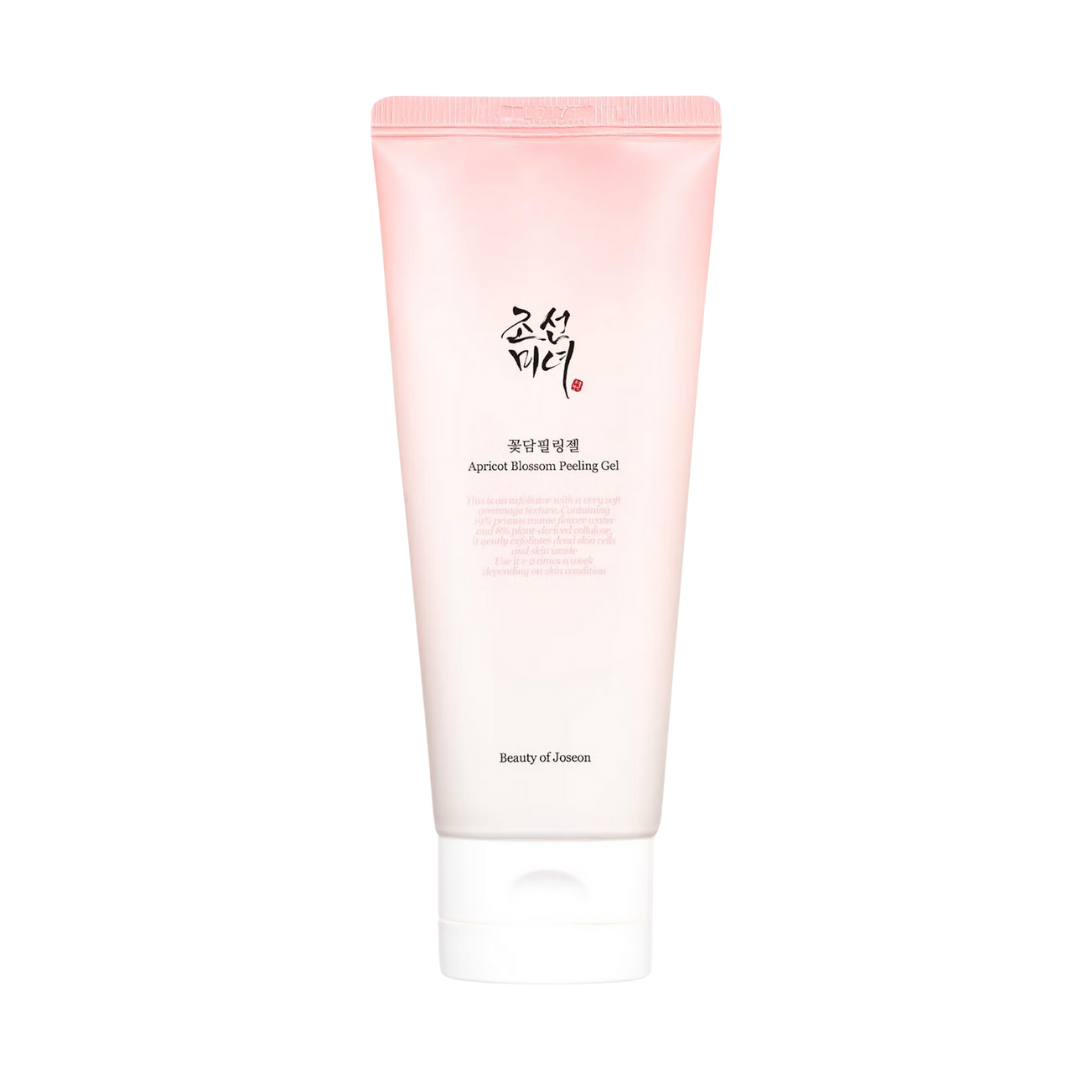 100ml tube of Beauty of Joseon Apricot Blossom Peeling Gel, a Korean skincare product with apricot blossom water for gentle exfoliation against a white flow backdrop