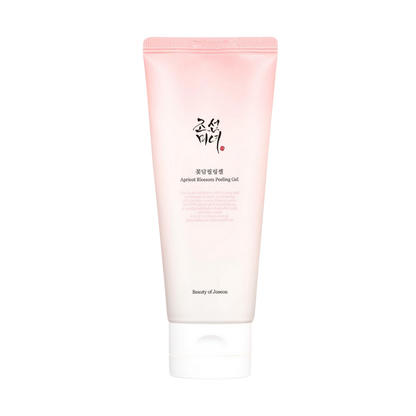 100ml tube of Beauty of Joseon Apricot Blossom Peeling Gel, a Korean skincare product with apricot blossom water for gentle exfoliation against a white flow backdrop