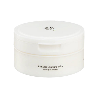 100ml tub of Beauty of Joseon Radiance Cleansing Balm, a sherbet-like balm that melts away makeup and impurities against a white flowy backdrop