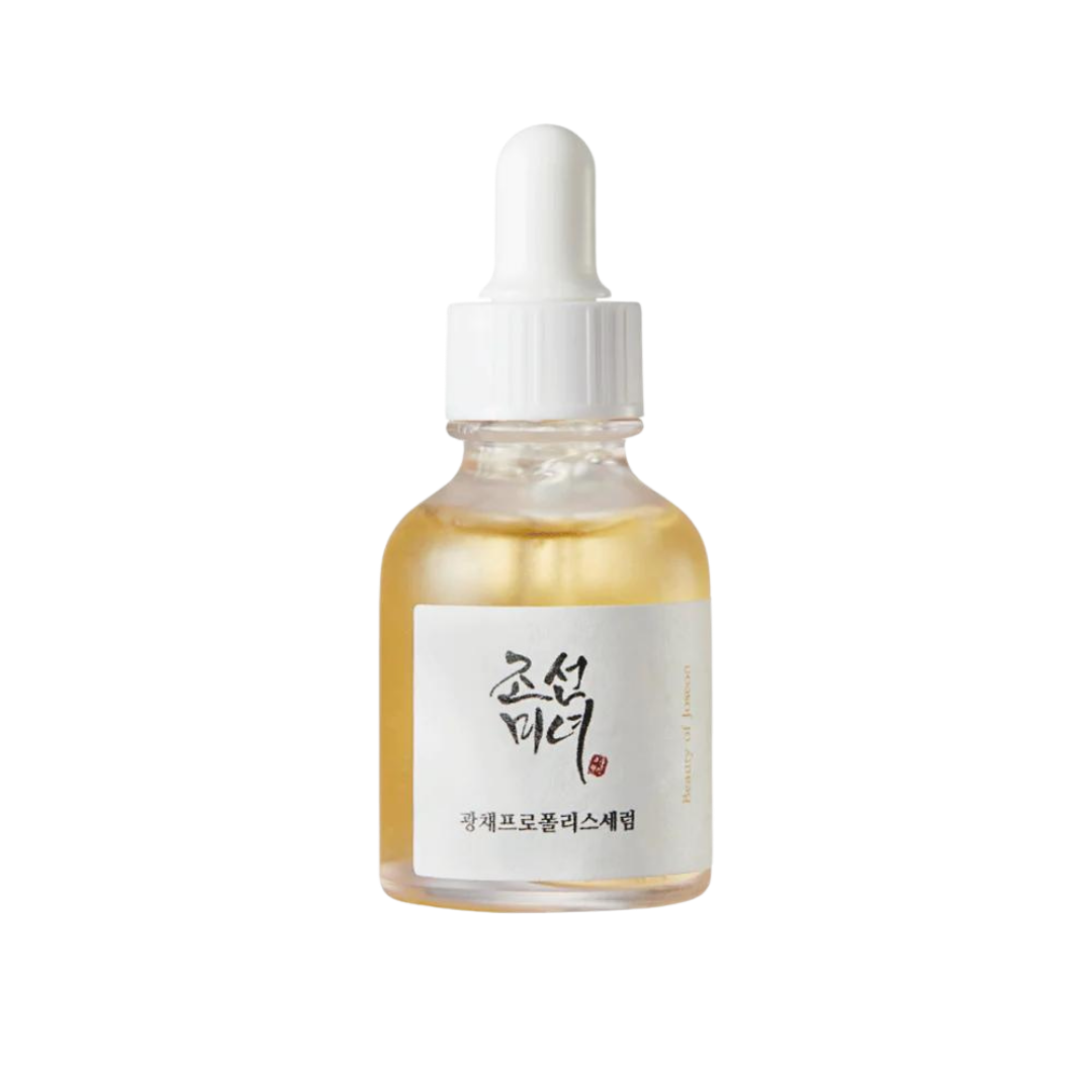 30ml bottle of Beauty of Joseon Glow Serum, a Korean skincare serum with propolis and niacinamide for radiant and balanced skin up against a white flowy backdrop