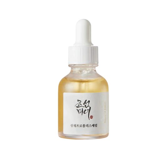 30ml bottle of Beauty of Joseon Glow Serum, a Korean skincare serum with propolis and niacinamide for radiant and balanced skin up against a white flowy backdrop