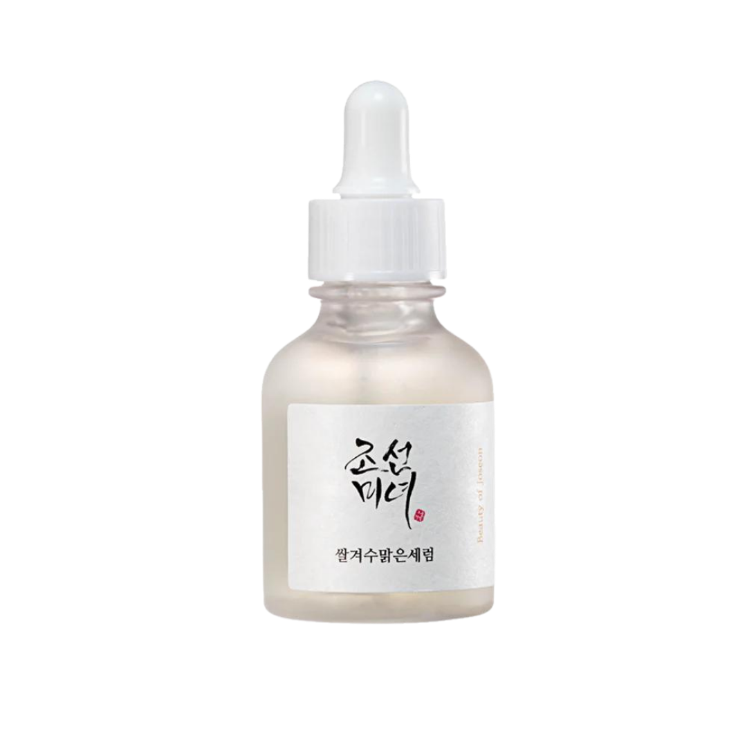 30ml bottle of Beauty of Joseon Glow Deep Serum, a Korean Hanbang (traditional herbal medicine) serum with rice and alpha arbutin for a radiant complexion up against a white flowy backdrop