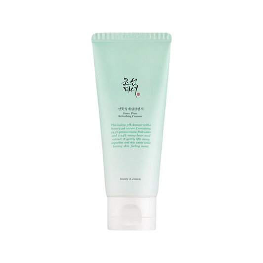 100ml green tube of Beauty of Joseon Green Plum Refreshing Cleanser, a lightweight gel cleanser with green plum and mung bean for gentle cleansing and hydration against a white flowy backdrop