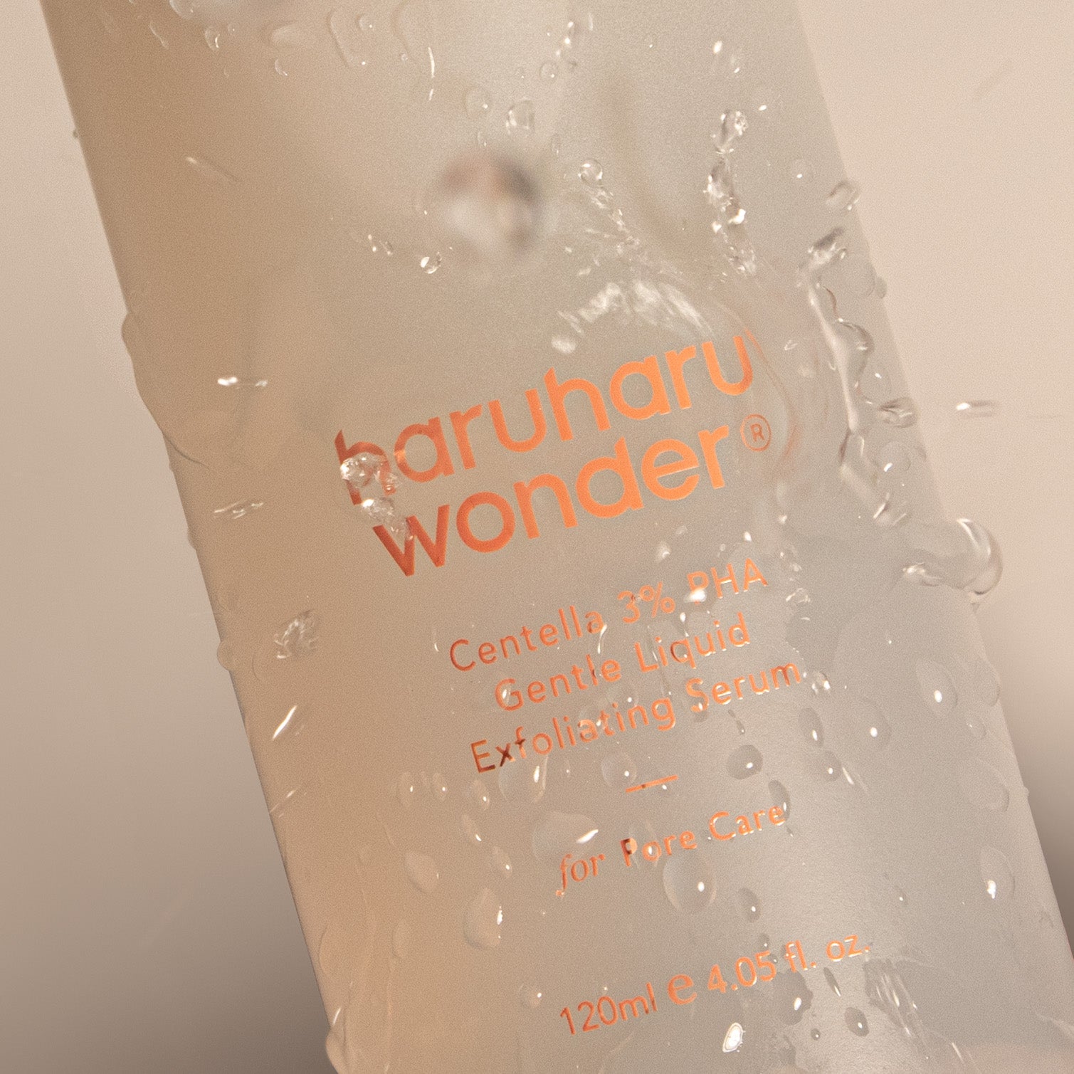 A white bottle with a dropper top containing 120ml of Haruharu Wonder Centella 3% PHA Gentle Liquid Exfoliating Serum, a vegan Korean skincare product for gentle exfoliation and pore care.