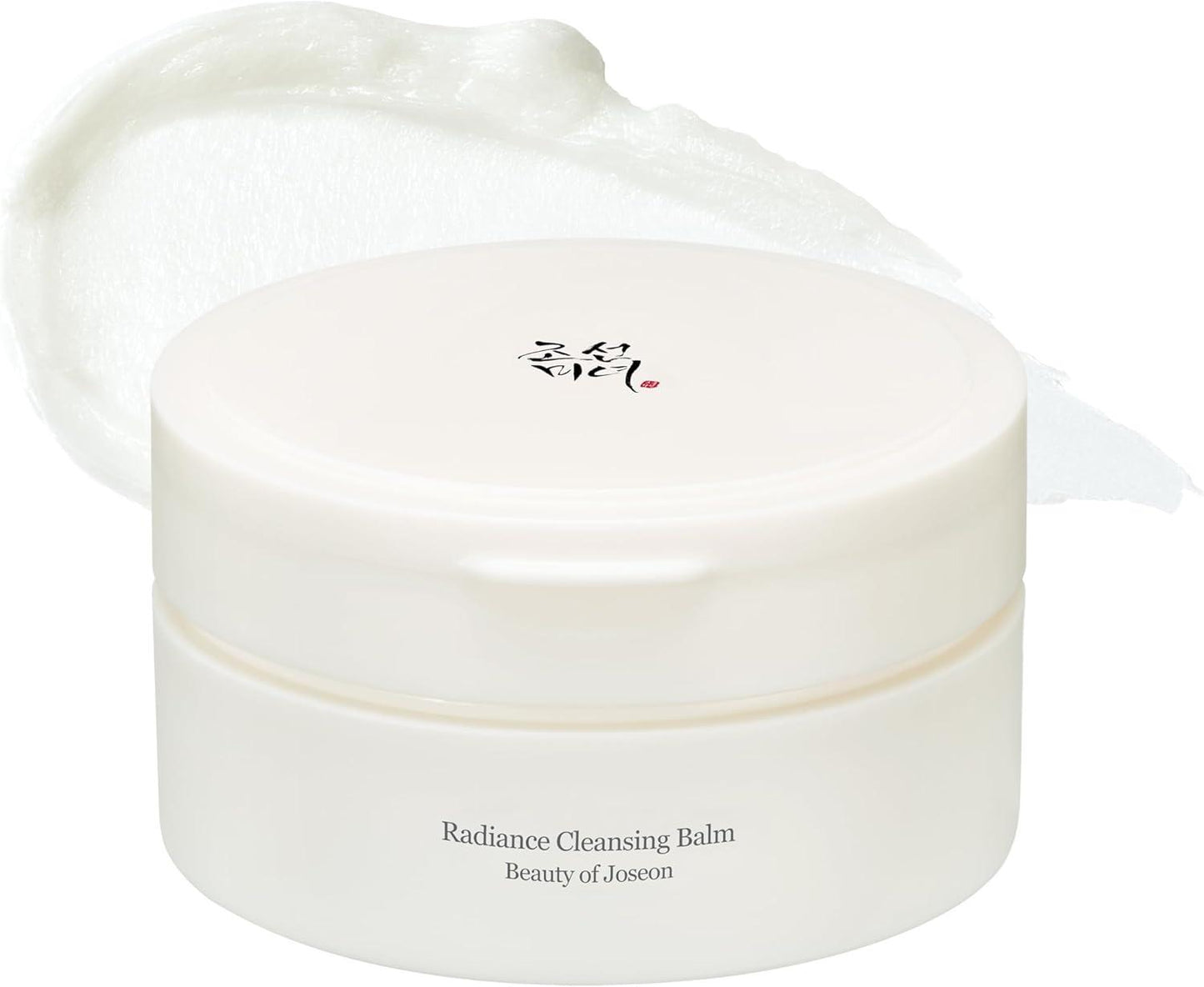 100ml tub of Beauty of Joseon Radiance Cleansing Balm, a sherbet-like balm that melts away makeup and impurities against a white flowy backdrop