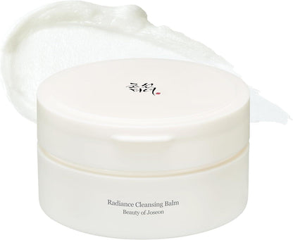 100ml tub of Beauty of Joseon Radiance Cleansing Balm, a sherbet-like balm that melts away makeup and impurities against a white flowy backdrop