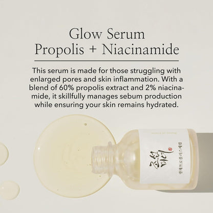 30ml bottle of Beauty of Joseon Glow Serum, a Korean skincare serum with propolis and niacinamide for radiant and balanced skin up against a white flowy backdrop