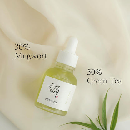 Beauty of Joseon Calming Serum, a lightweight, green tea-based serum for hydrating and soothing irritated skin. Serum is in a small bottle against a flowy white background