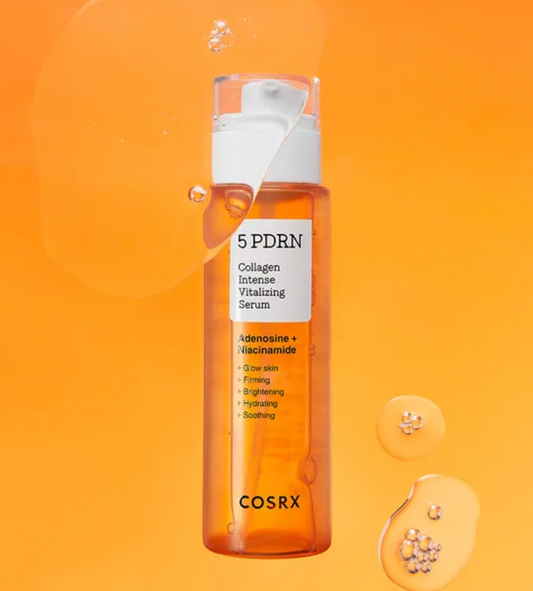 COSRX 5 PDRN Collagen Intense Vitalizing Serum in an amber orange bottle with a white pump dispenser, set against a vibrant orange background with decorative liquid droplets.