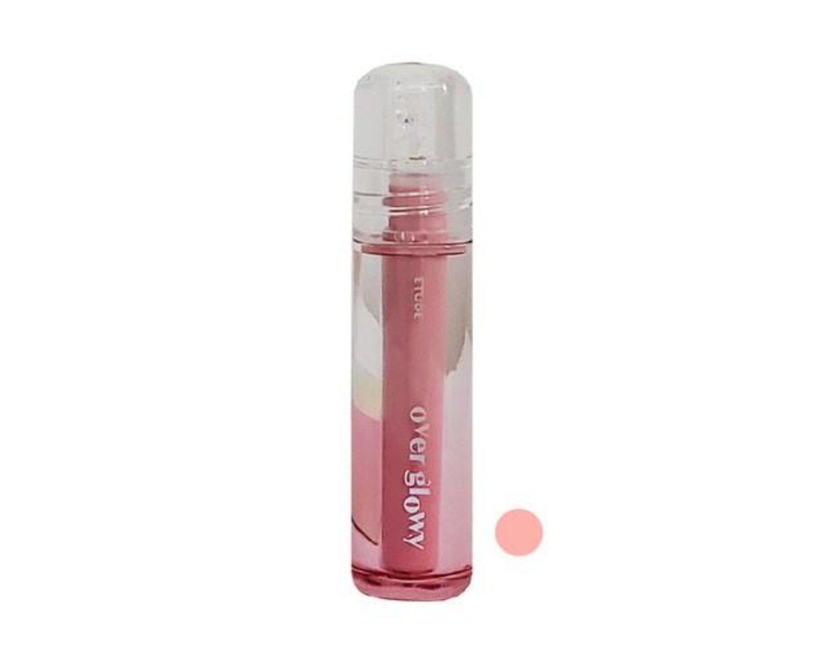 A clear cylindrical roller bottle containing pink liquid. A small round pink swatch is shown to the right of the bottle against a plain white background.