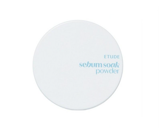 A round white compact lid for ETUDE Sebum Soak Powder, featuring the brand name and product name in light blue text, set against a plain white background.