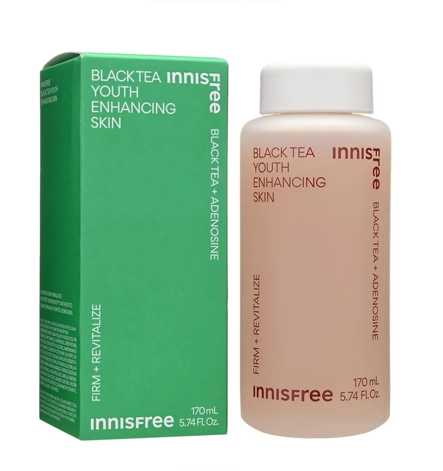 Innisfree Black Tea Youth Enhancing Skin serum bottle next to its green packaging box on a white background.