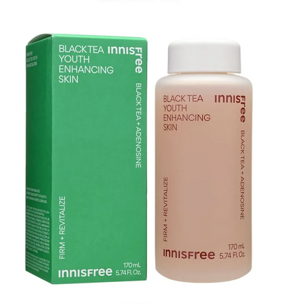 Innisfree Black Tea Youth Enhancing Skin serum bottle next to its green packaging box on a white background.