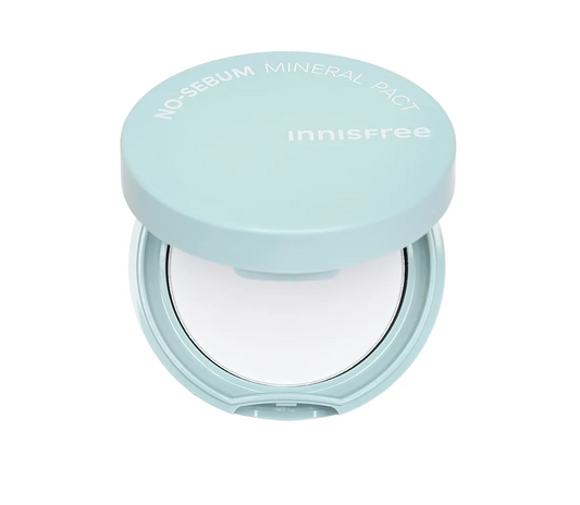 Innisfree No-Sebum Mineral Powder compact in a light pastel blue-green color, shown open against a solid white background.