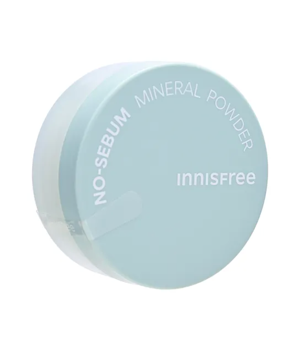 Innisfree No-Sebum Mineral Powder in a round, light pastel blue jar with a clear lid, shown on a solid white background.