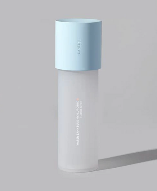 A frosted glass skincare bottle with a light blue cap, featuring vertical text that reads 'LANEIGE' and 'WATER BANK BLUE HYALURONIC ESSENCE TONER' on a neutral gray background.