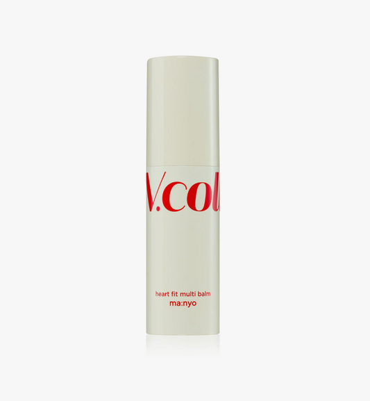 A tall, cylindrical white balm tube with red text reading 'V.col' and 'heart fit multi balm ma:nyo