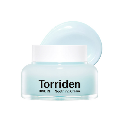 A light blue and white jar of Torriden Dive In Soothing Cream, with the lid propped open behind the jar against a solid white background.